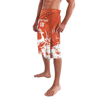 Men's orange football shorts with white splatter, custom number 15 and logo