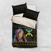 Black bedding set top view with woman portrait duvet, two black pillow covers