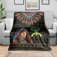 Black Berber pattern blanket draped on sofa, woman portrait, colorful necklace, gold stripe