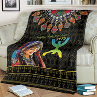 Black Berber pattern throw with woman face, teal 2975 symbol, and gold zigzag border