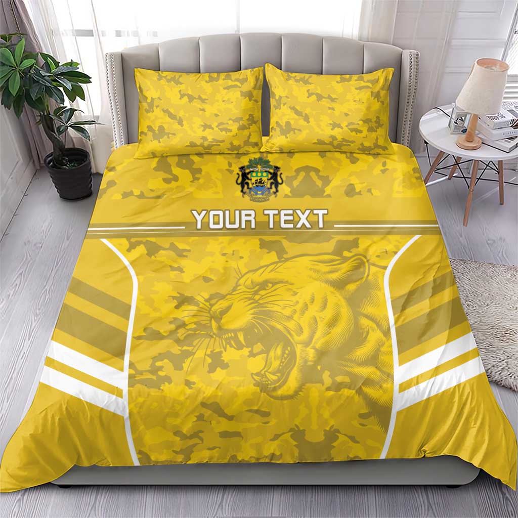 Yellow camo football bedding set with lion emblem, white stripe panel, 2 matching pillows