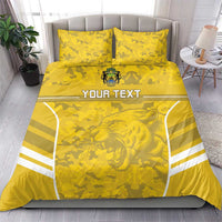 Yellow camo football bedding set with lion emblem, white stripe panel, 2 matching pillows