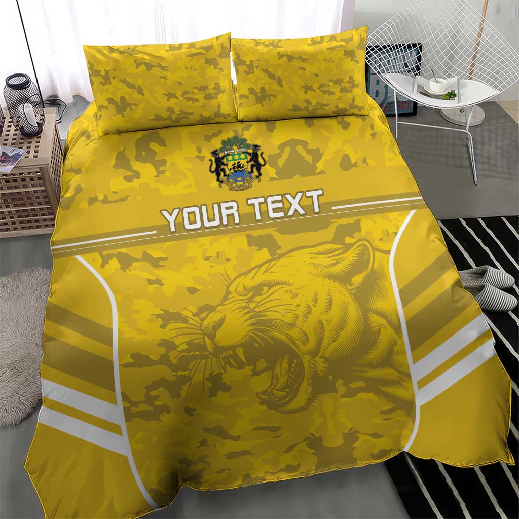 Yellow football bedding set featuring lion graphic, camouflage print, white stripe corners