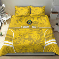 Yellow football bedding set with lion emblem center, camo background, two zip pillows