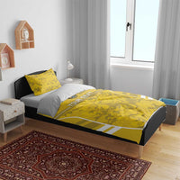 Yellow custom football bedding set on bed: lion emblem duvet, matching camo pillows, stripes