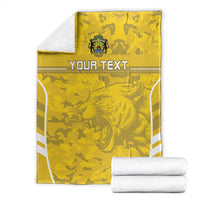 Custom yellow football blanket folded with crest, lion graphic, and 'YOUR TEXT'