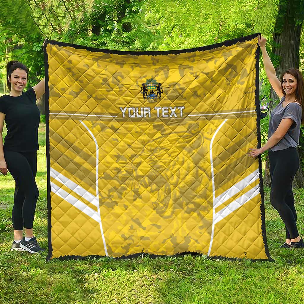 Yellow football quilt with white field shapes and custom text, quilted fabric with crest emblem