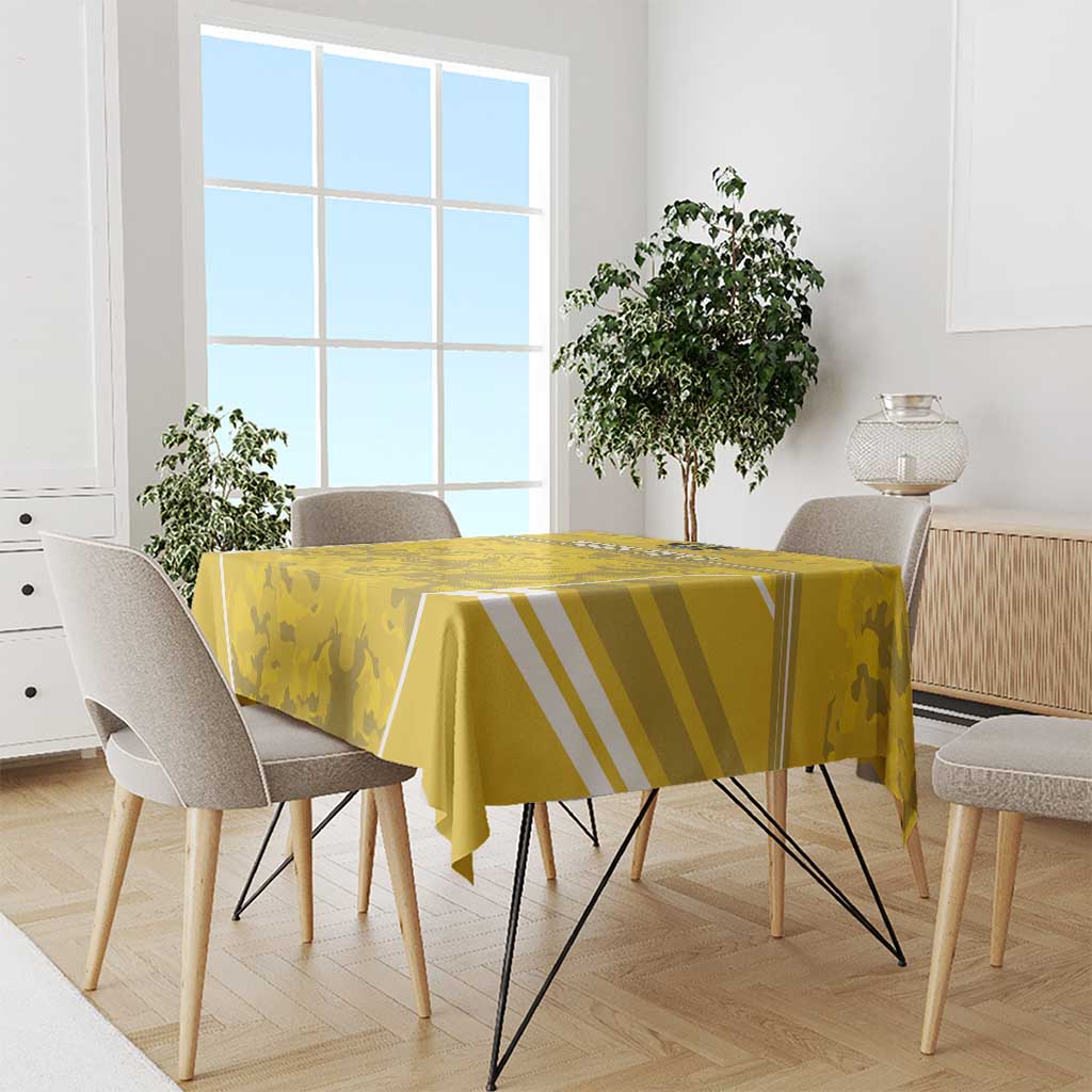 Yellow football tablecloth with camouflage pattern and white diagonal stripe trim