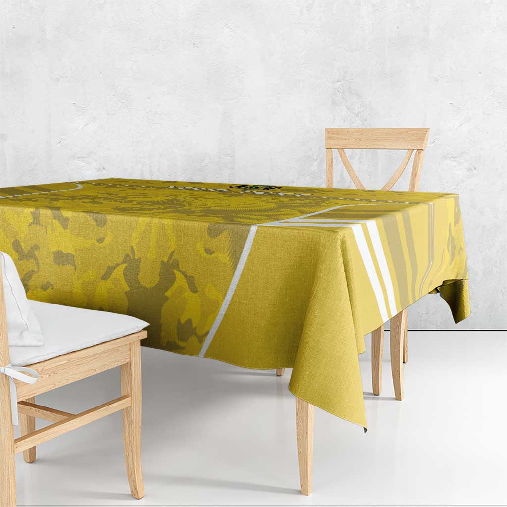 Yellow football tablecloth with white diagonal stripe accents and camo texture