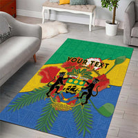 Green African-style area rug with colorful coat of arms crest and animal silhouettes
