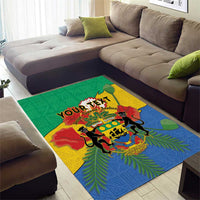 Green African-style area rug with colorful crest, fern leaves, and animal figures