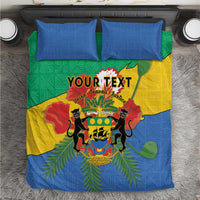 Personalised Gabon bedding set with coat of arms, blue green yellow duvet and two pillows