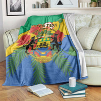 Green, yellow and blue personalized blanket coat with coat-of-arms and African pattern design