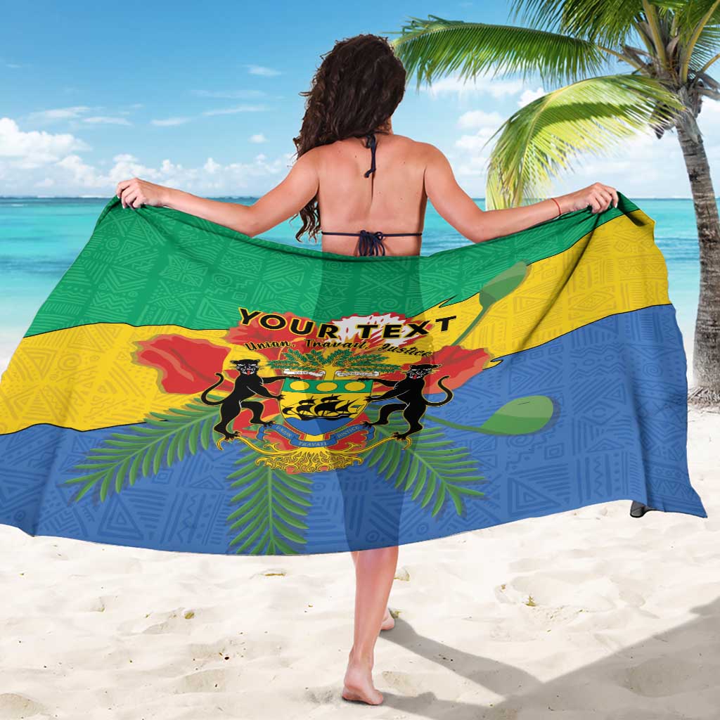 Personalized Gabon sarong beach wrap, back view with coat of arms graphic in green and blue