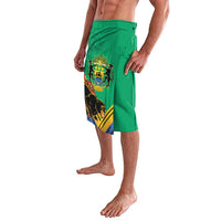 Green lavalava shorts with coat-of-arms print and black panther graphic on left leg