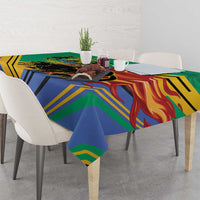 Corner view of green Gabon coat-of-arms tablecloth with panther and flame graphics