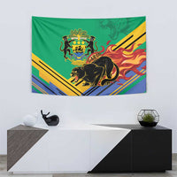 Green wall tapestry with Gabon coat of arms emblem, black lion, and multicolor stripe accents