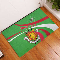 Green rubber doormat featuring Burundi coat of arms, 'YOUR TEXT', and 1962 emblem