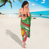Green personalized sarong coat with Burundi crest, stripes, and map graphic