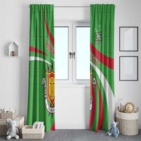 Green printed window curtain pair with Burundi crest and diagonal red/white stripe design.