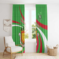 Green printed window curtain pair with 1962 emblem and Burundi crest over red/white stripes.