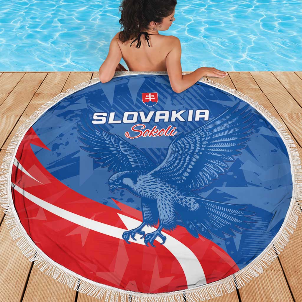 Round Slovakia beach blanket, blue eagle graphic with red/white stripe and fringed border.