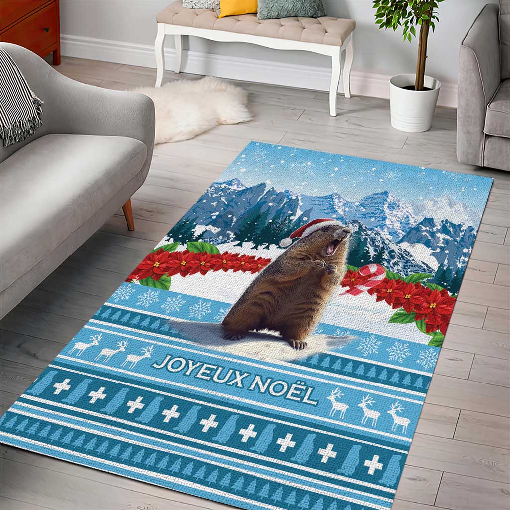 Blue Christmas area rug with marmot, mountains, poinsettias, and Joyeux Noel pattern
