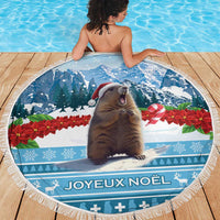 Round beach blanket with Christmas marmot, mountains, and blue trim