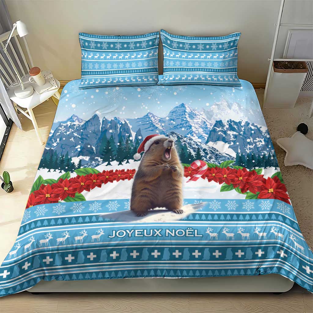 Blue bedding set with marmot, snowy mountains, and Joyeux Noel text