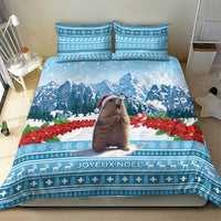 Blue bedding set with marmot, snowy mountains, and Joyeux Noel text