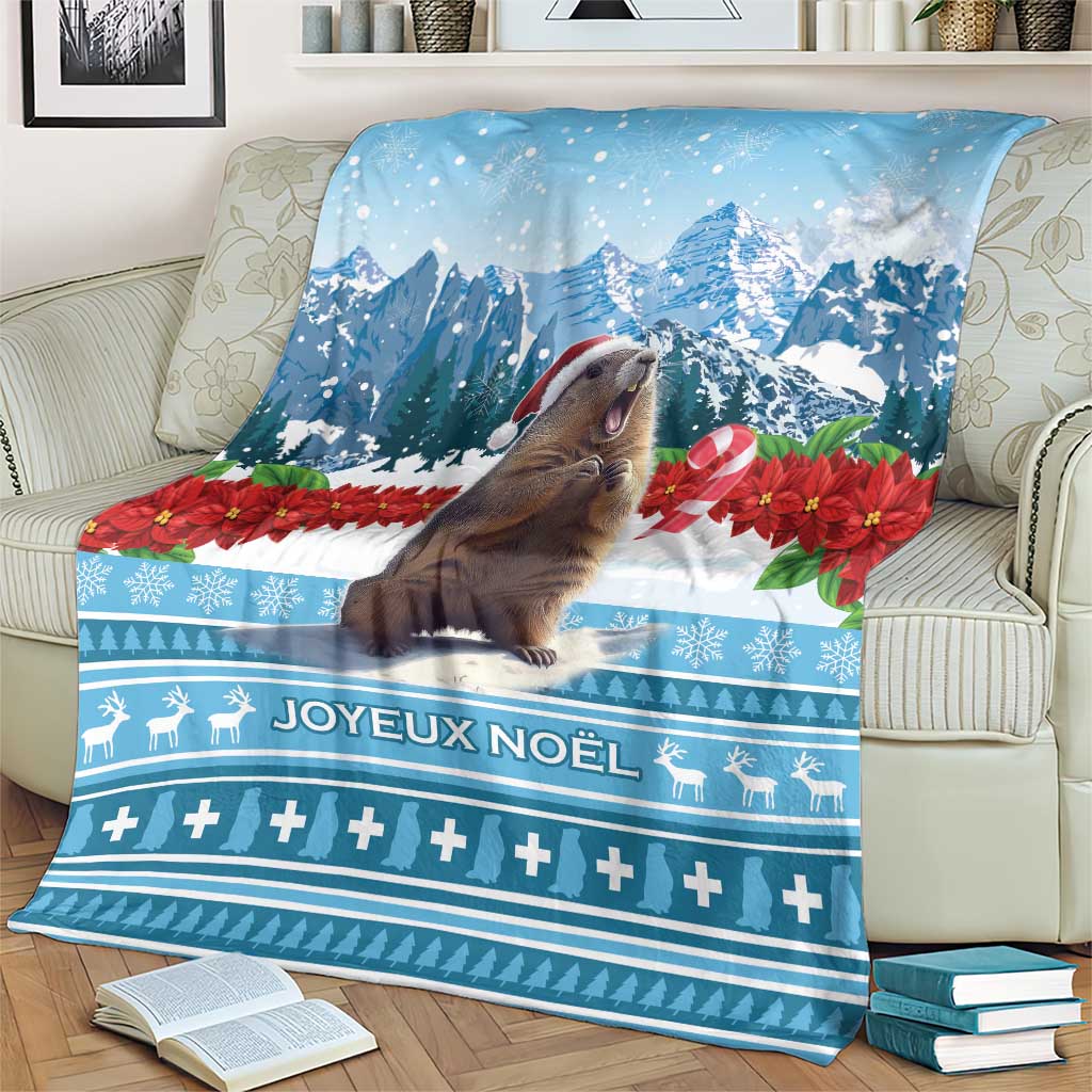Blue Christmas marmot blanket with mountain scene, marmot, and Joyeux Noël pattern