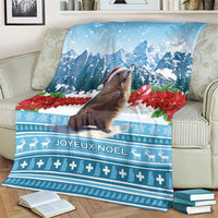 Blue Christmas marmot blanket with mountain scene, marmot, and Joyeux Noël pattern
