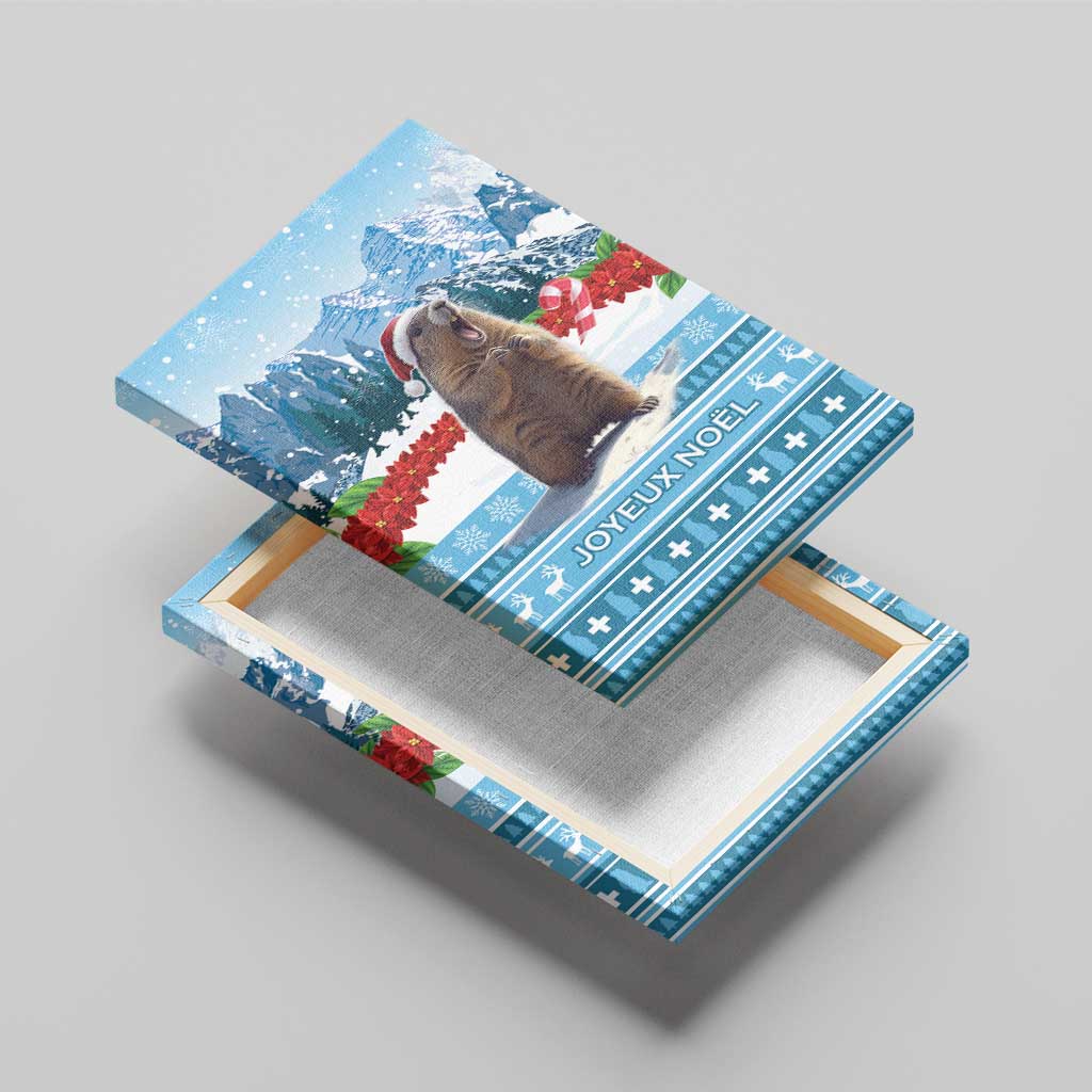 Blue canvas wall art with marmot in Santa hat, snowy mountains, and holiday border