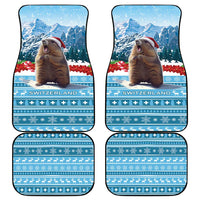 Set of four blue Switzerland holiday car mats with marmot and snowy mountain scene