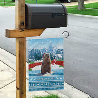 Blue Christmas garden flag hanging from wood post, marmot, snowy mountains, 'Joyeux Noel'