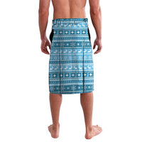Blue patterned swim shorts, back view, elastic waistband and geometric border