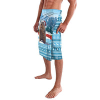 Blue patterned swim shorts with animal graphic and winter icons, side view