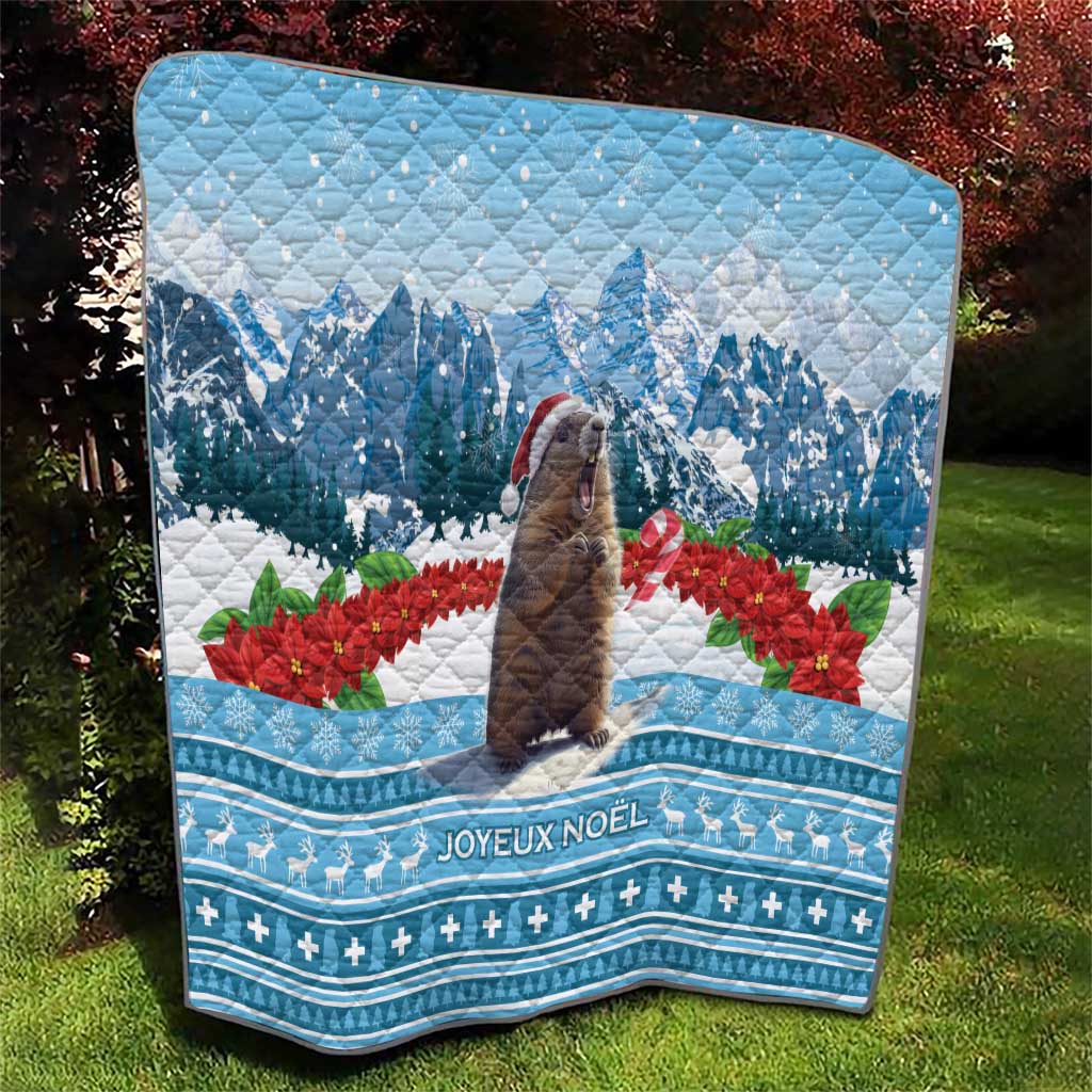Blue Christmas quilt with marmot, mountain scene, and Joyeux Noel text