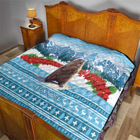 Blue Christmas quilt with marmot, snowflakes, and Joyeux Noel text