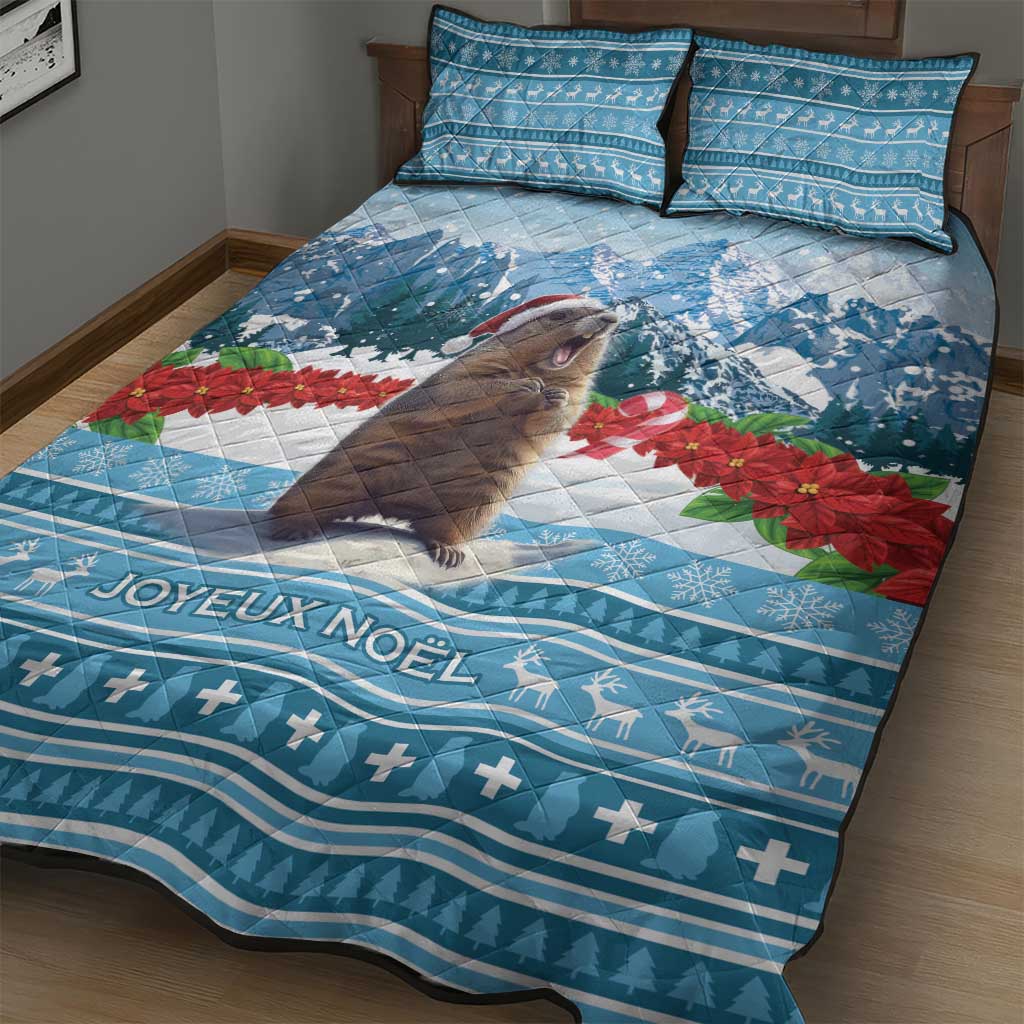 Blue Christmas quilt bed set with marmot, poinsettias, JOYEUX NOEL text, and 2 pillows