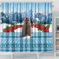 Blue Christmas shower curtain with marmot in red hat, snowy landscape, poinsettias, plus-pattern border.