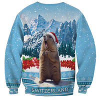 Blue Christmas sweatshirt, back view with marmot, mountains, and SWITZERLAND text