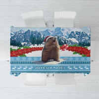 Blue Christmas tablecloth featuring a marmot and JOYEUX NOEL text, winter motifs
