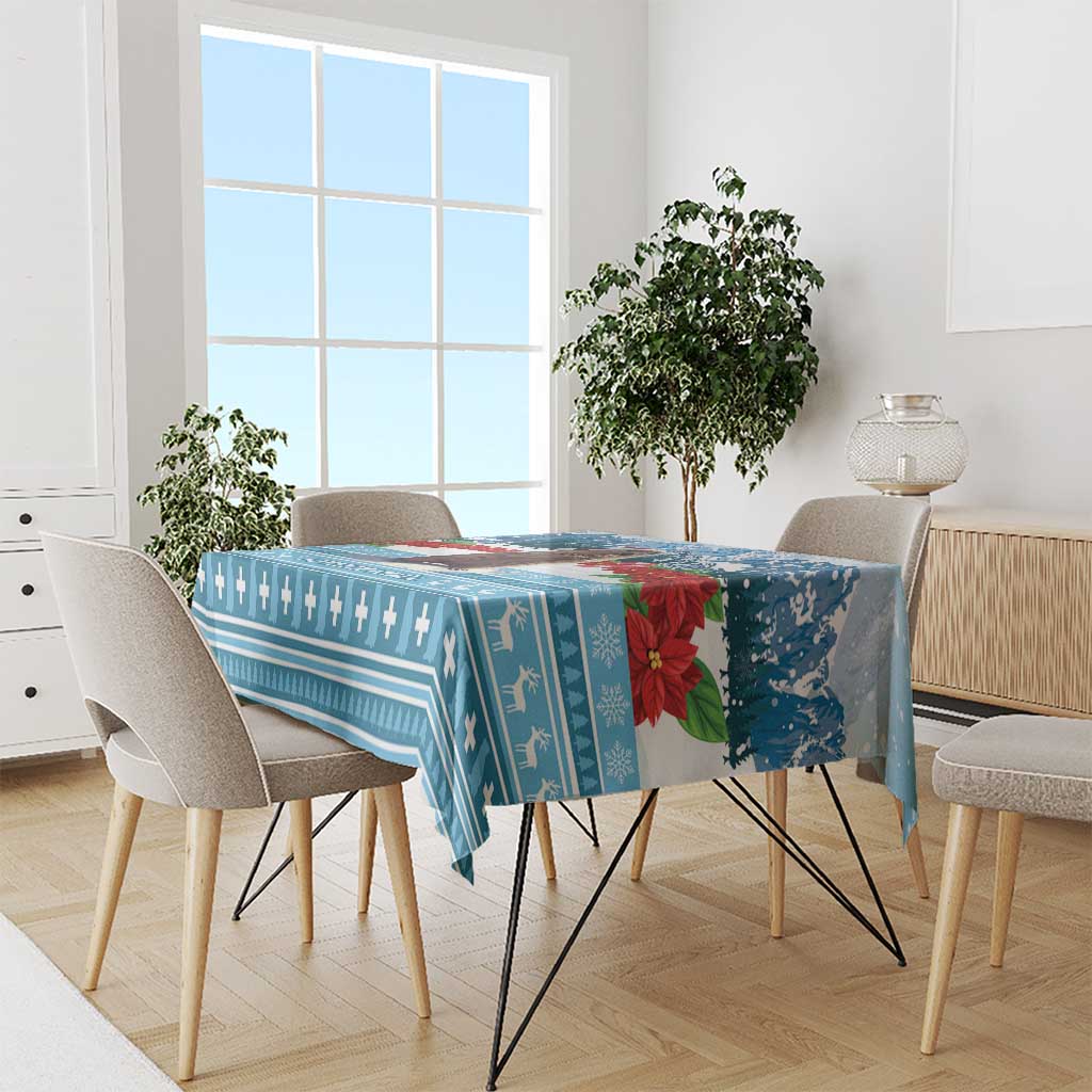 Blue Christmas tablecloth with geometric crosses and winter stripe pattern