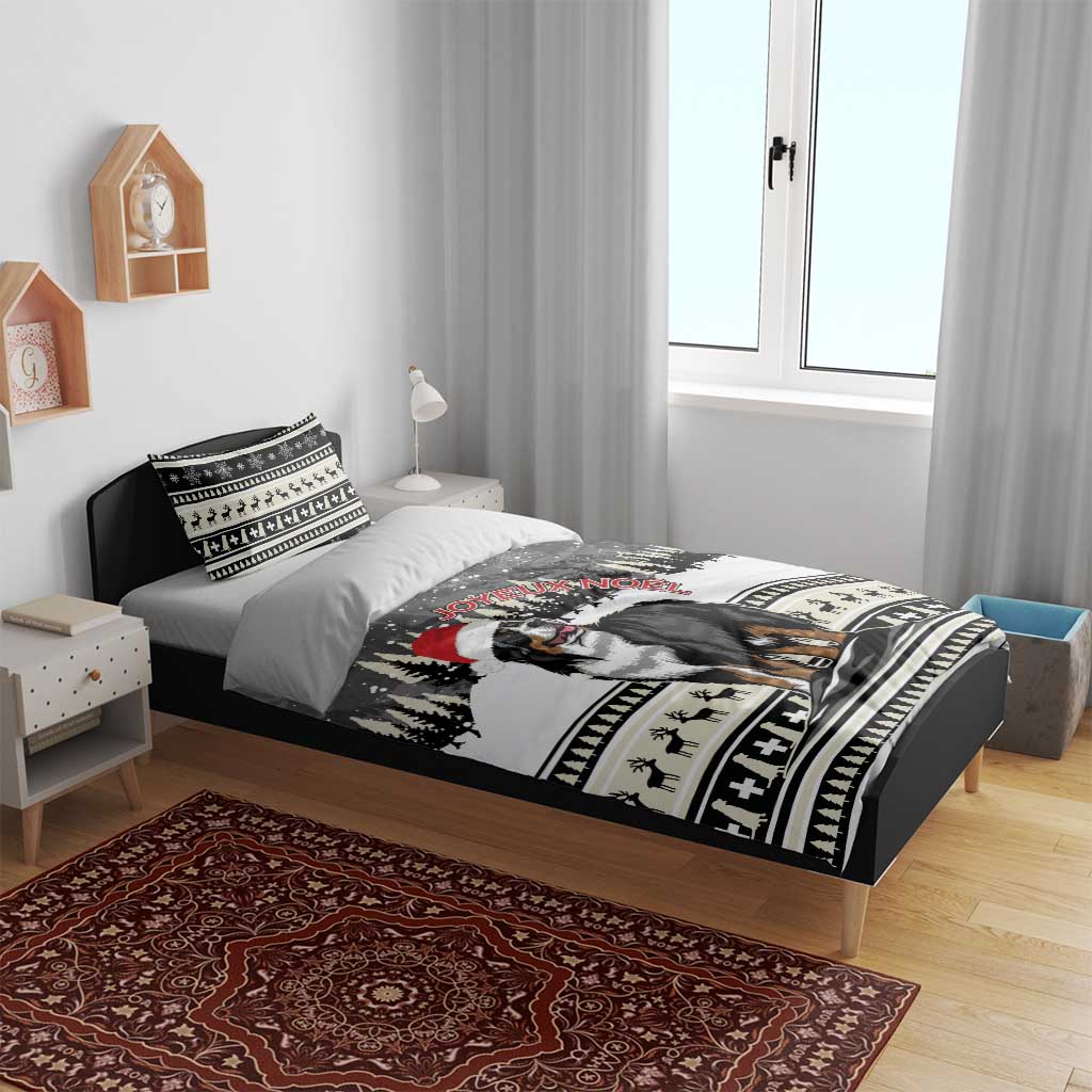 Bernese mountain dog duvet on bed with Santa hat, snowy trees, and black ornamental border
