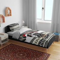 Bernese mountain dog duvet on bed with Santa hat, snowy trees, and black ornamental border
