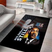 Black area rug featuring MLK Day portrait, flag stripes, and 'His Dream' lettering