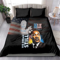 Black bedding set with two dark pillows, MLK Day graphic portrait on duvet