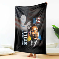 Black MLK Day blanket featuring Martin Luther King Jr. portrait and American flag motifs