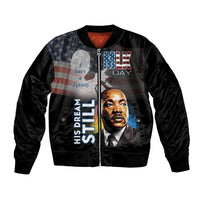 Black unisex bomber jacket with zipper front, portrait print and American flag graphic